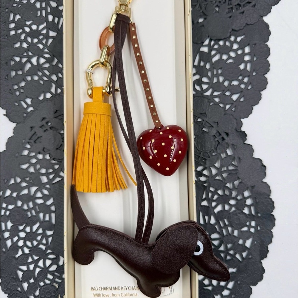 eye candy Brown Dachshund Bag Charm with Yellow Tassel and Red Heart